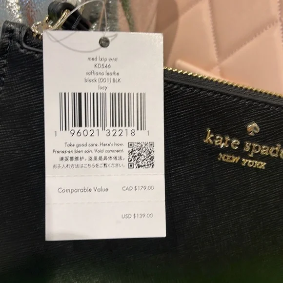 Kate Spade Lucy Medium L-Zip Wristlet
COLOR:
Black (Non Glitter)
NWT - Picture 10 of 16